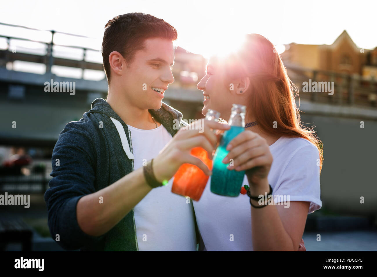 Joyful nice people enjoying their drinks So delicious. Stock Photo