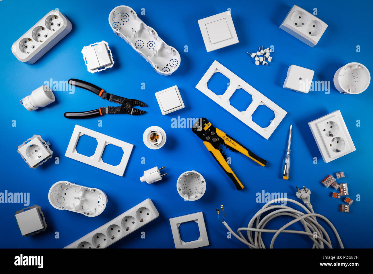 electrical tools and equipment on blue background. top view flat lay Stock Photo