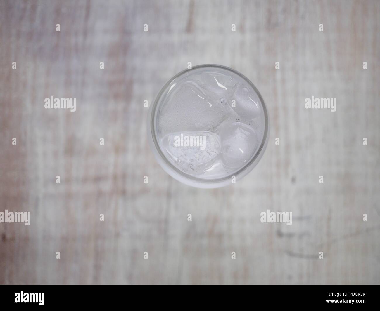 Ice water in a glass cup Stock Photo - Alamy