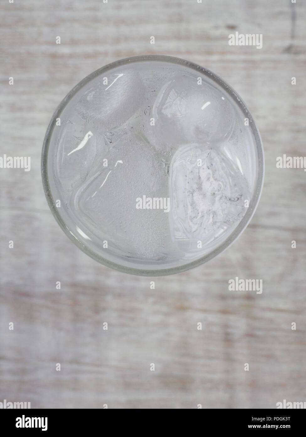 Ice water in a glass cup Stock Photo - Alamy