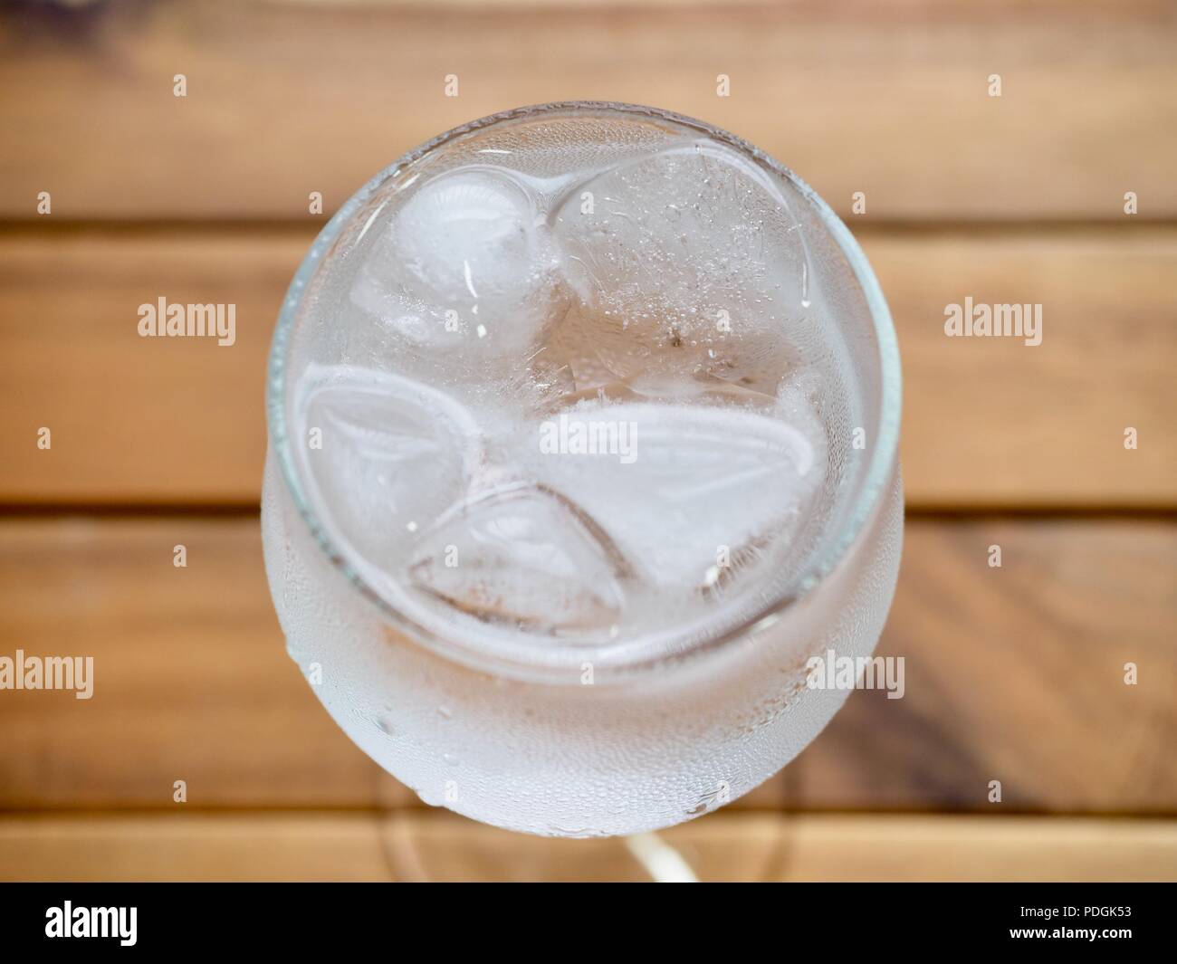Ice water in a glass cup Stock Photo - Alamy