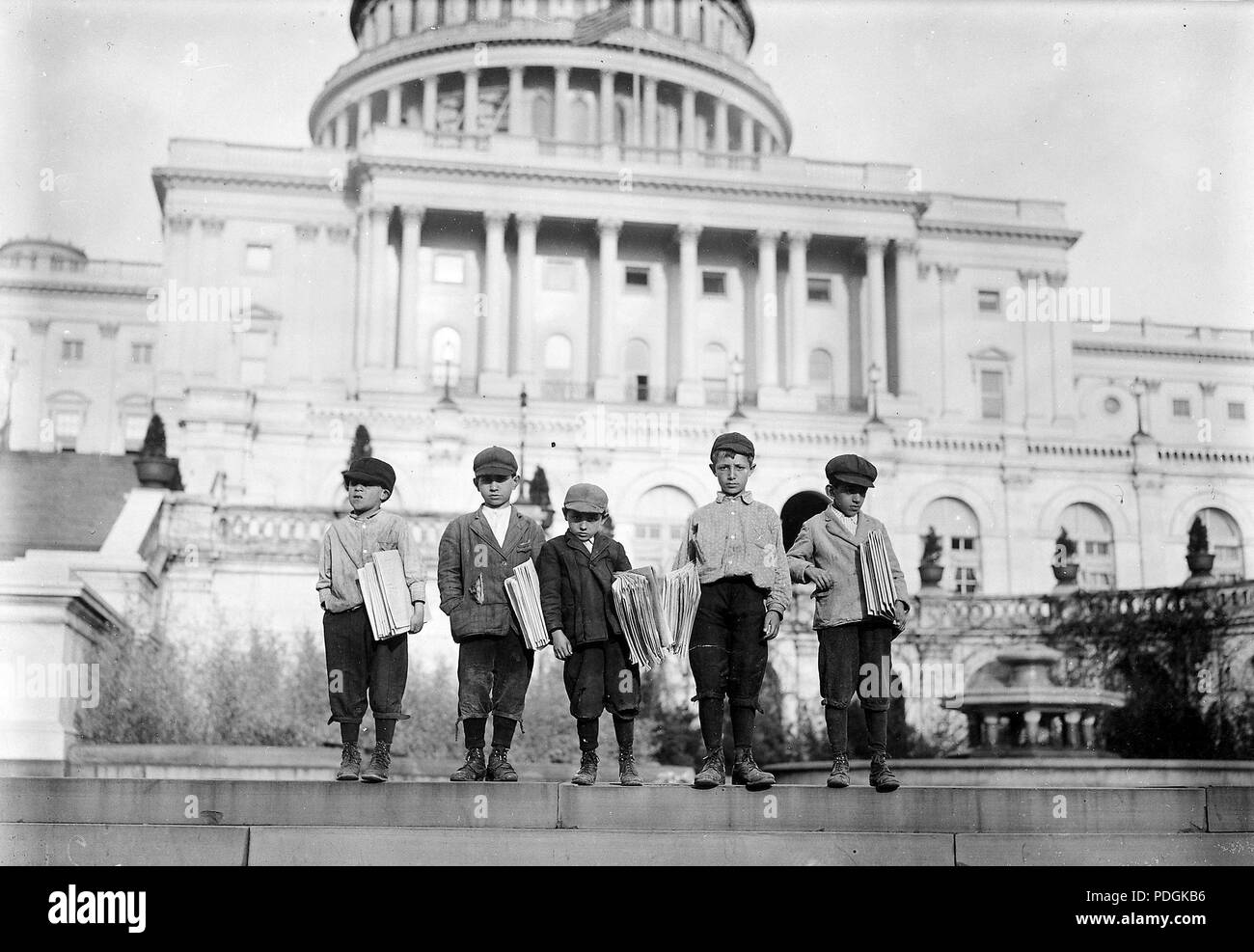 Group of newsies selling on capitol steps, April 1912 Stock Photo