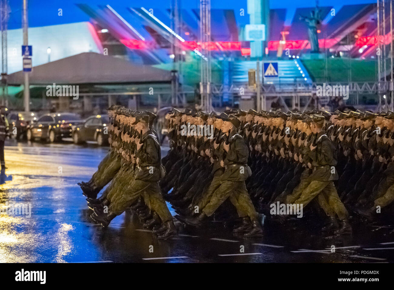 Minsk, Belarus- June 28, 2017:  Soldiers Marching At Street During Night Rehearsal Of Parade Before Celebration Of Independence Day Of Belarus. Stock Photo
