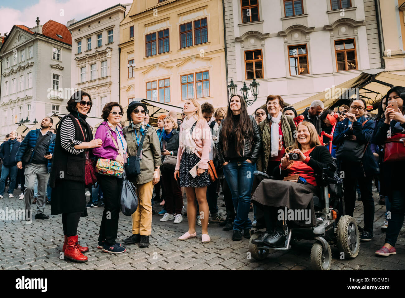 Prague, Czech Republic - September 22, 2017: Group Of Tourists Taking Photo Of Town Hall With Astronomical Clock - Orloj. Stock Photo