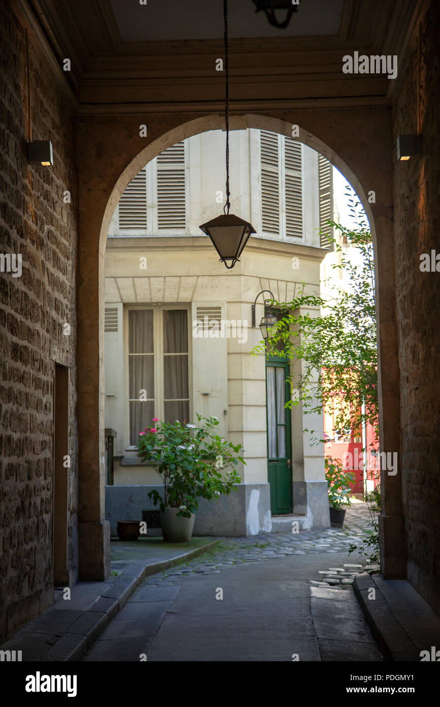 Courtyard Through Arch Paris, France Stock Photo Alamy