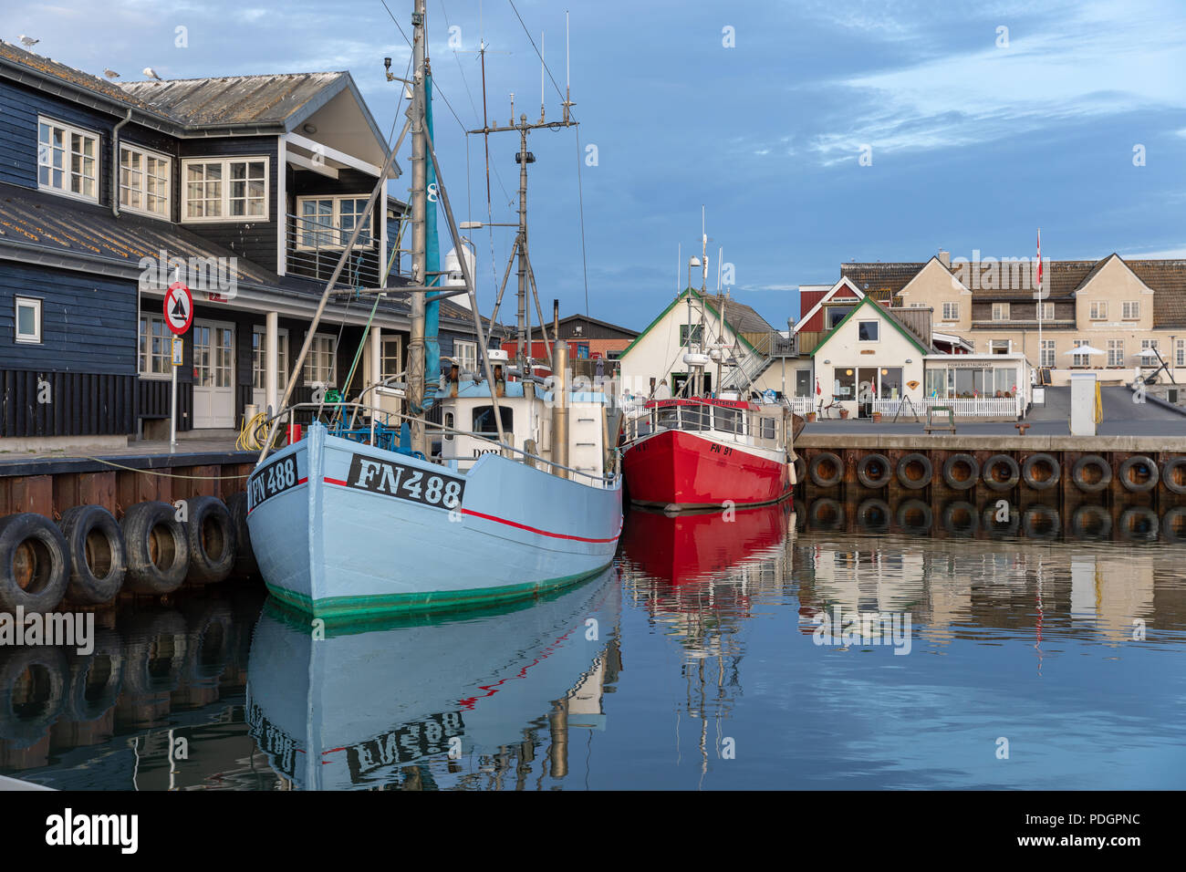 Fishing vessels, evening; Oesterby Harbour, Laesoe, Denmark Stock Photo