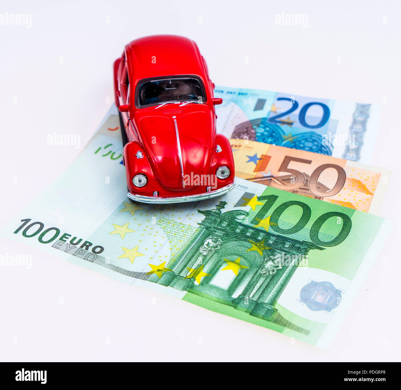 Modellauto und Euro Scheine, Studioaufnahme Stock Photo