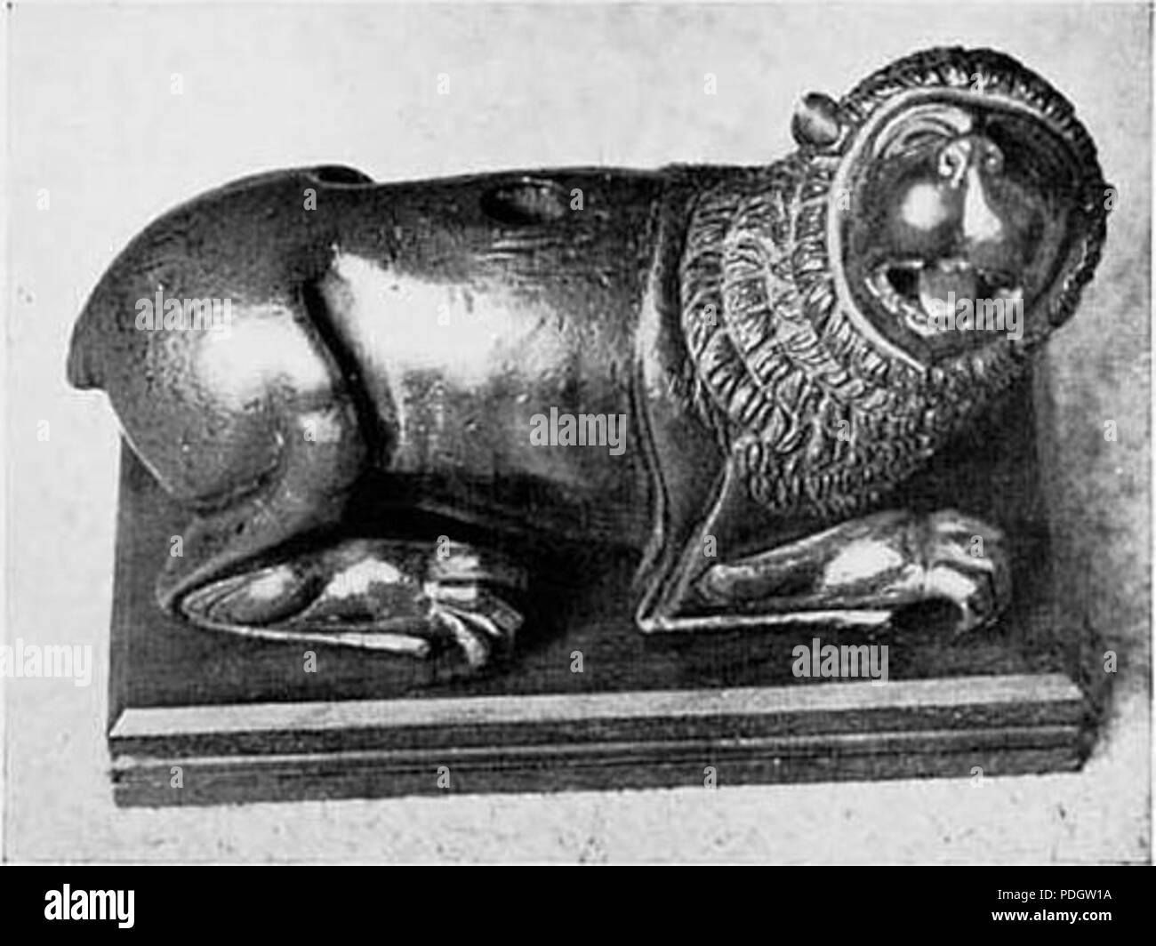 214 Lying lion fragment of a religious object 12th century Stock Photo