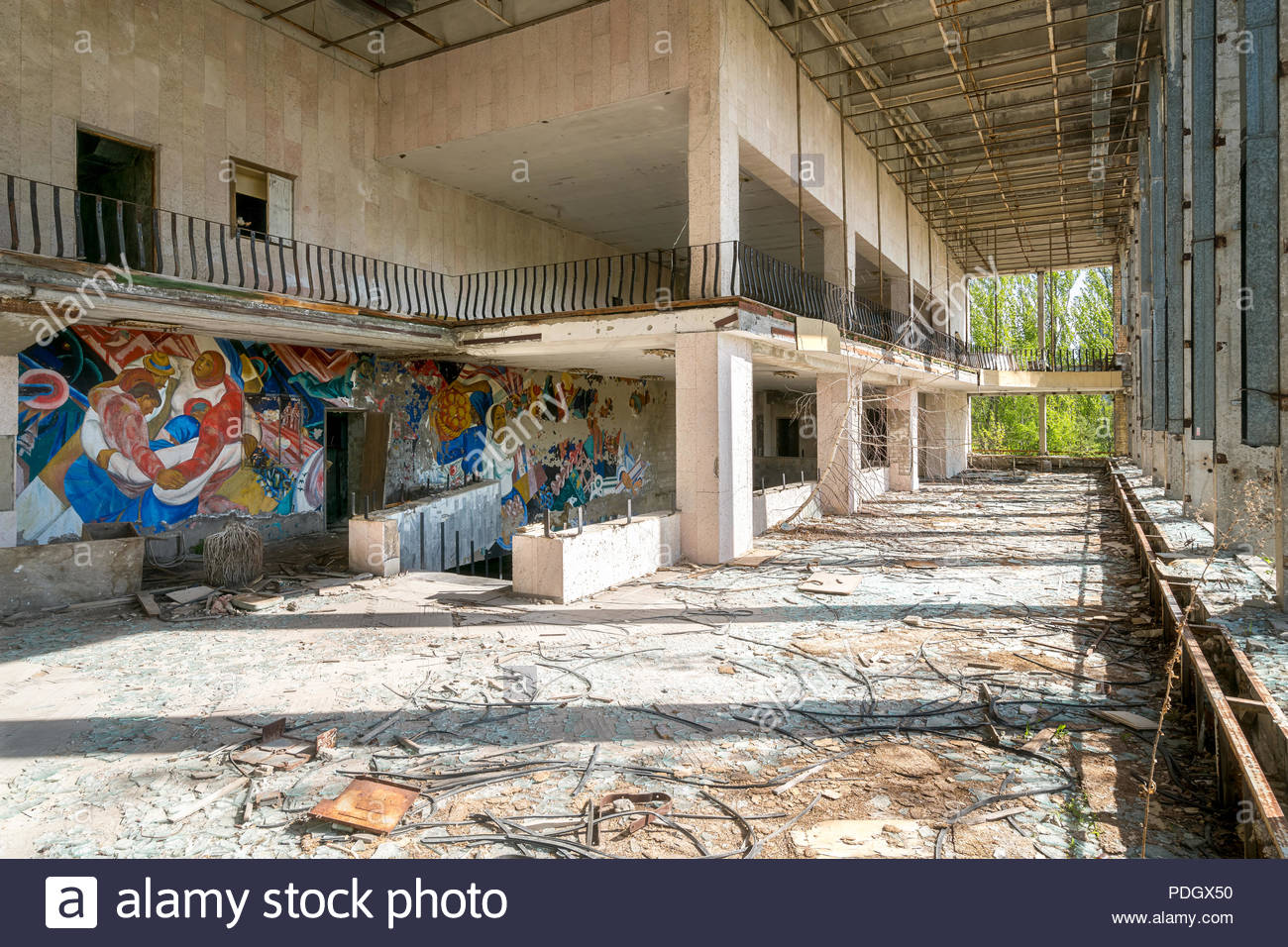 Decaying interior of an abandoned building with peeling paint and ...