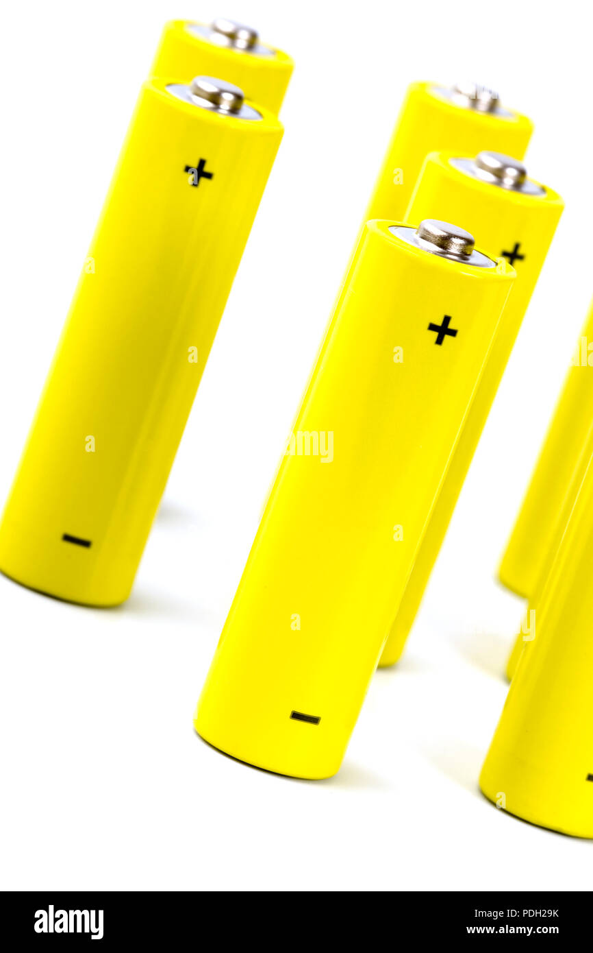 yellow alkaline batteries closeup on white background Stock Photo Alamy