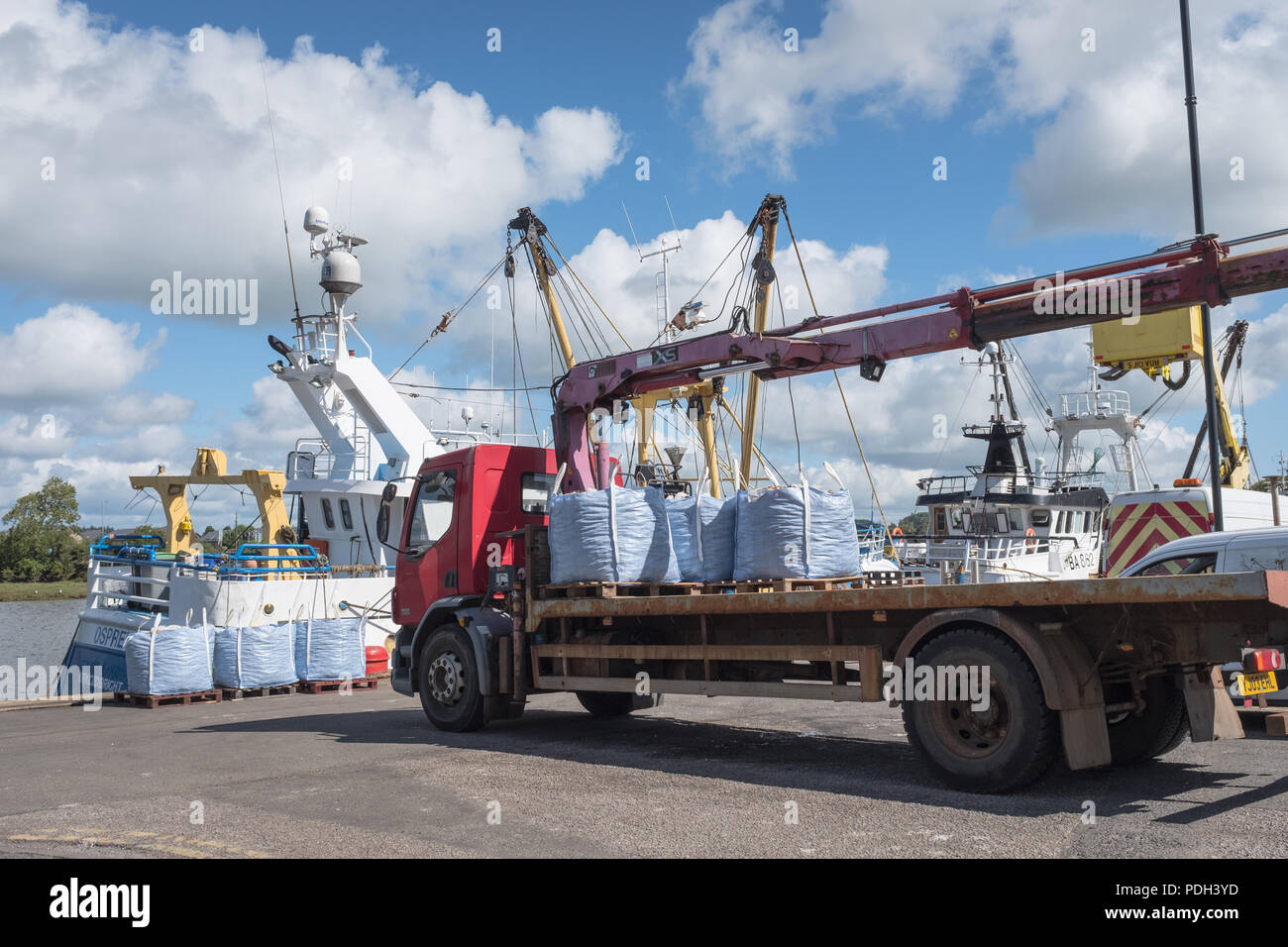 A view of Kirkcudbright Harbour which shows a catch of shellfish being ...