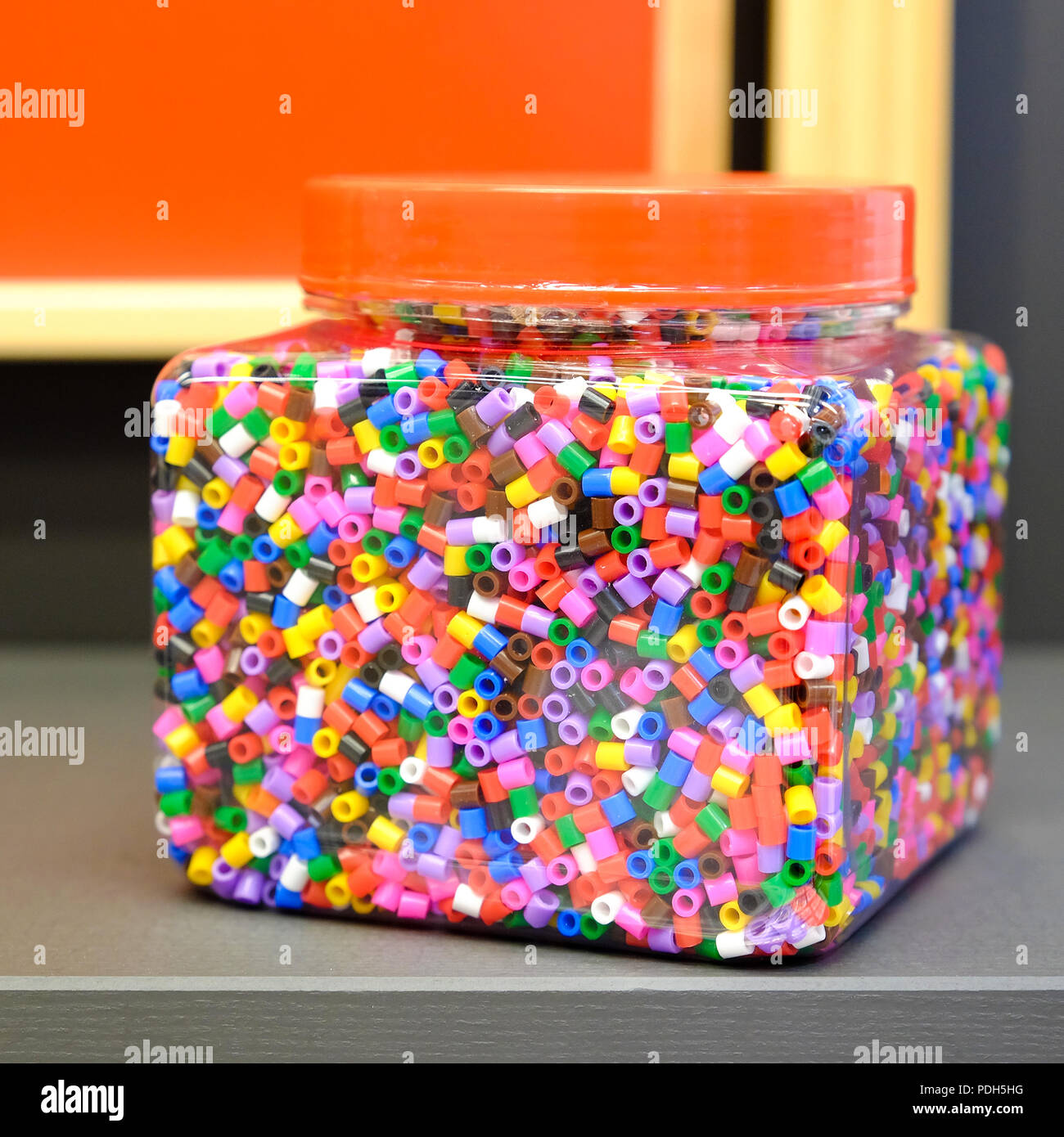 Children's colorful beads for peyote stitch. Big plastic jar. For different  crafts Stock Photo - Alamy