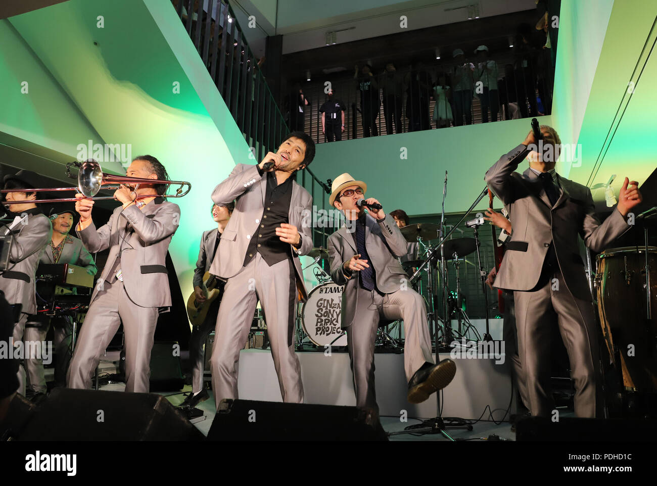 Tokyo, Japan. 9th Aug, 2018. Members of Ska Paradise Orchestra perform at the opening ceremony of the Ginza Sony Park which has a ground level park and four floors underground facilities in Tokyo on Thursday, August 9, 2018. Sony Building closed last year and reopened as a park until 2020, then Sony will reopen the building in 2022. Credit: Yoshio Tsunoda/AFLO/Alamy Live News Stock Photo