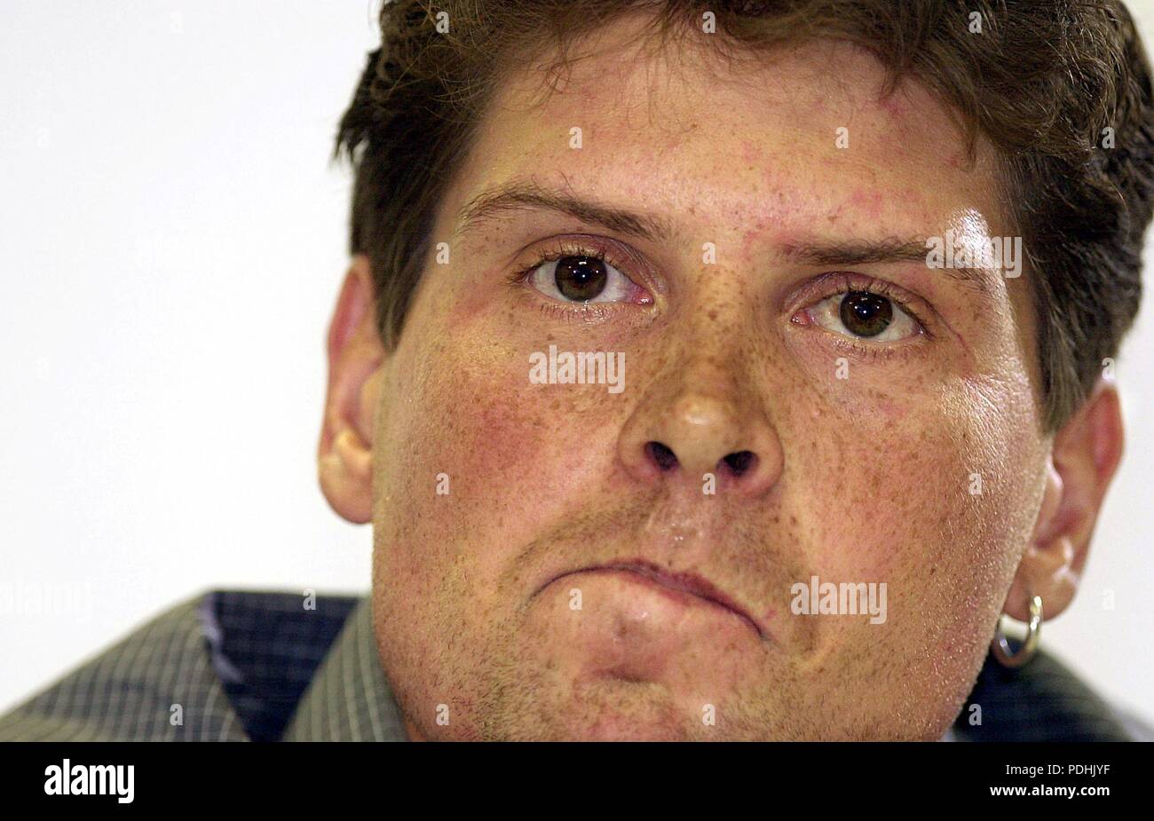 Frankfurt, Germany. 6th July, 2002. (dpa) - German cyclist Jan Ullrich of team Telekom grimaces during a press conference in Frankfurt, Germany, 6 July 2002. Germany's 1997 Tour de France champion Jan Ullrich admitted that he had taken recreational drugs on a night out with friends in June because he was depressed about a knee operation which did not resolve a long standing injury. | usage worldwide Credit: dpa/Alamy Live News Stock Photo