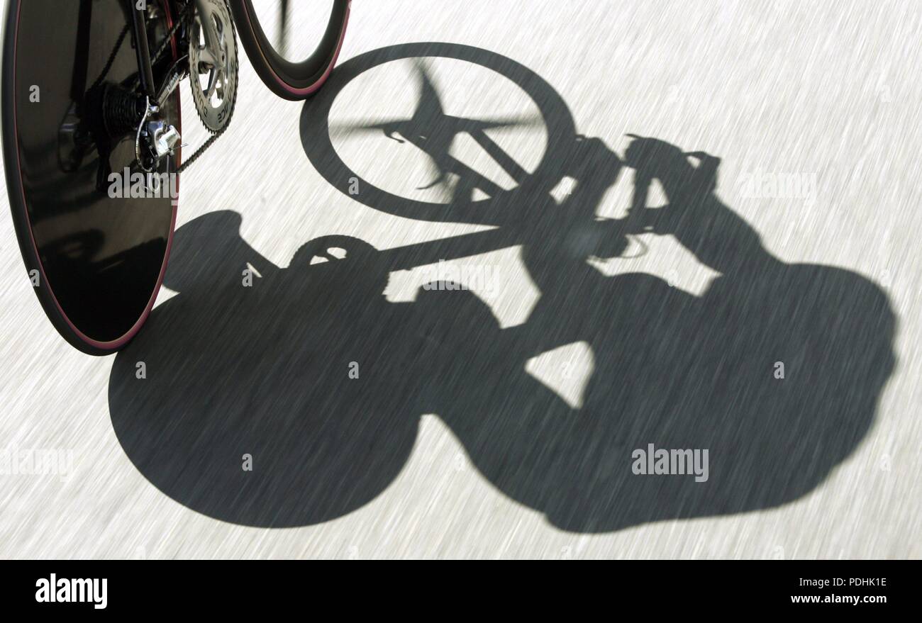 Karlsruhe, Germany. 31st May, 2004. (dpa) - During the first stage of the Tour of Germany cycle race, a 23, 7 km long time trial, the shadow of German cyclist Jan Ullrich (team T-mobile) can be seen on the asphalt in Karlsruhe, Germany, 31 May 2004. The seven stage long tour totals 1,095.7 km and leads from Karlsruhe to Leipzig. | usage worldwide Credit: dpa/Alamy Live News Stock Photo