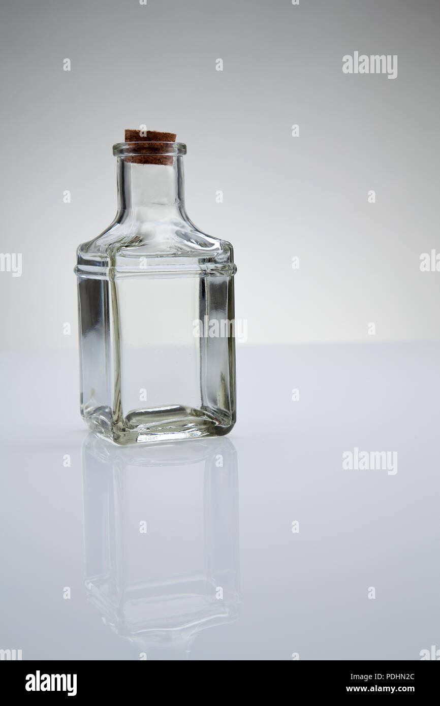 bottle of clear liquid on the white background Stock Photo - Alamy
