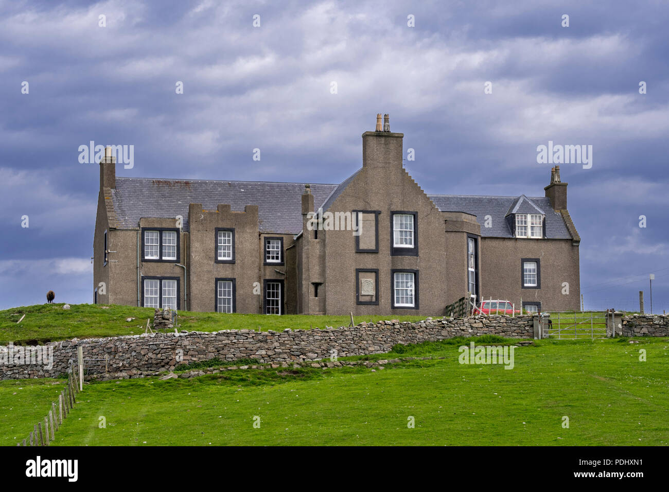 Lunna House, 17th-century laird's house and base of the wartime Shetland Bus operation on Lunna Ness in the Shetland Islands, Scotland, UK Stock Photo