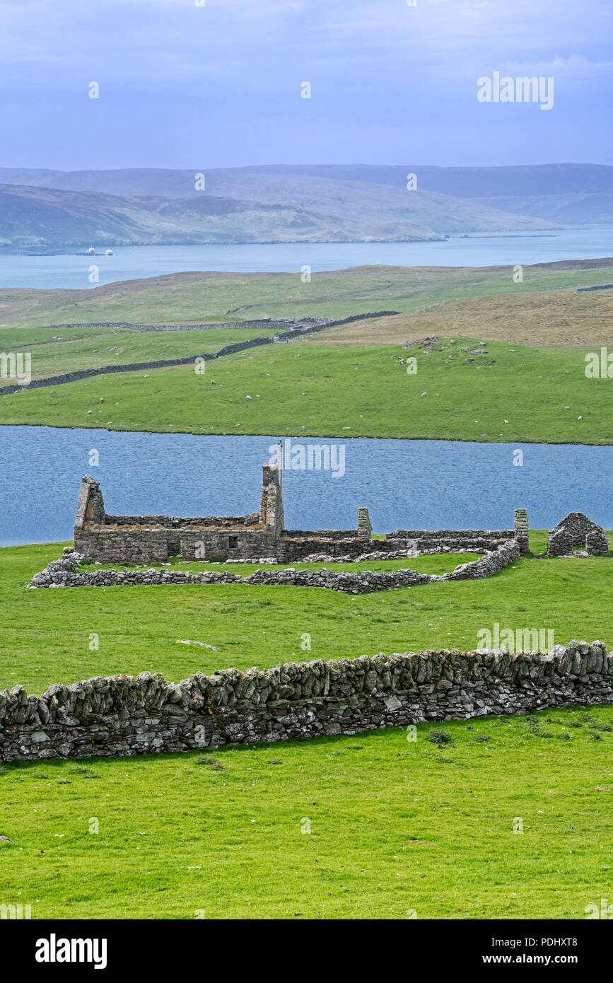 Dry stone / drystack wall and remains of croft, abandoned during the Highland Clearances, Shetland Islands, Scotland, UK Stock Photo