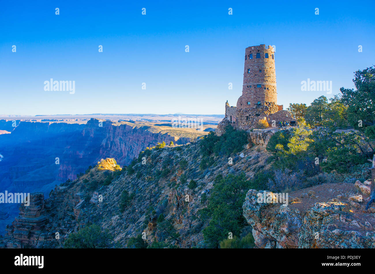 Tall stone watchtower stands guard on Grand Canyon Rim Stock Photo - Alamy