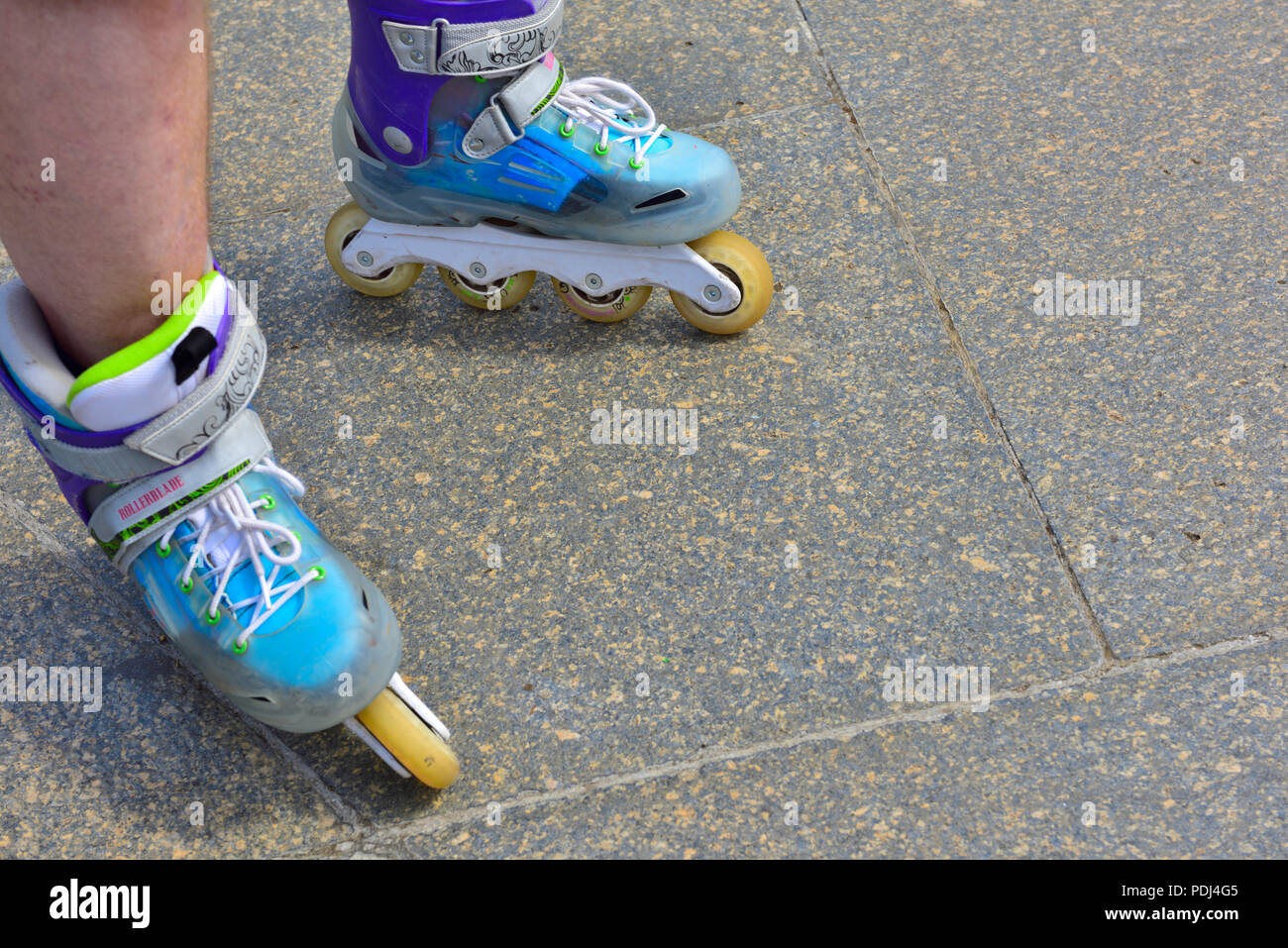Man wearing inline roller skates Stock Photo Alamy