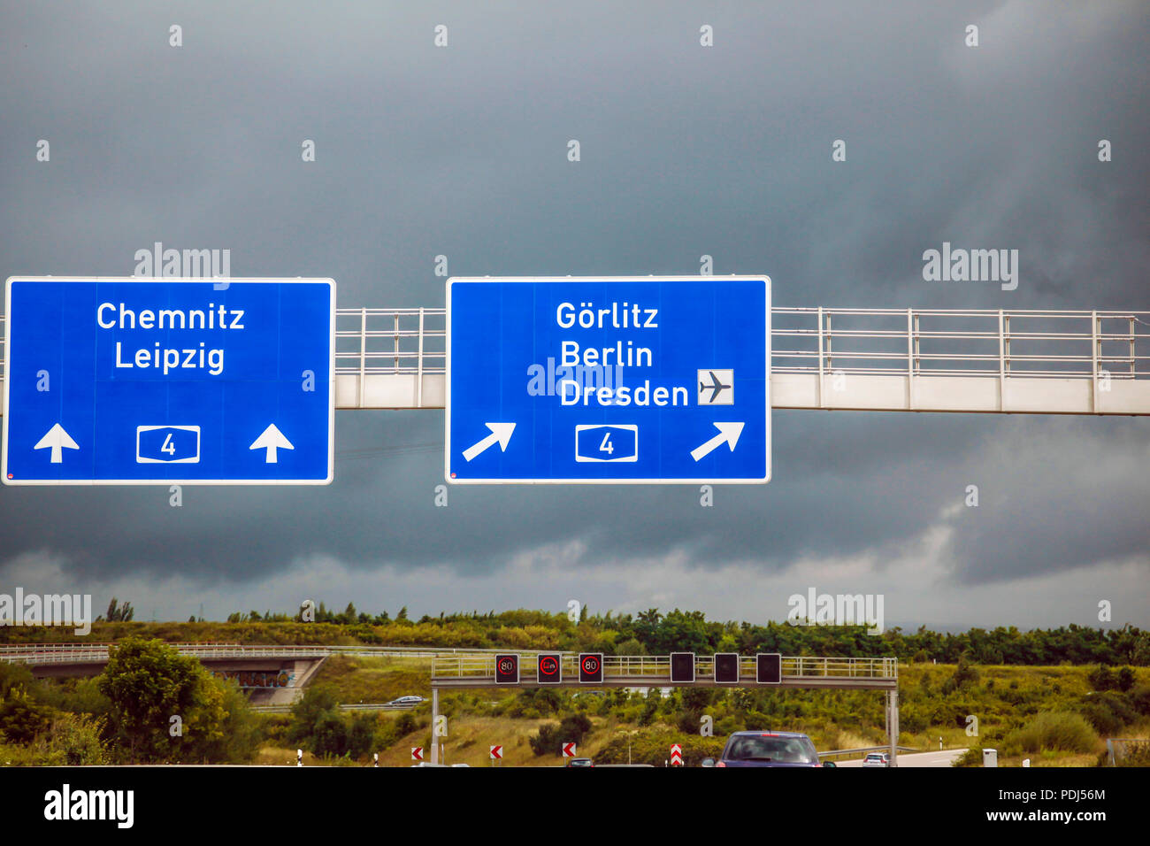 Blue overhead autobahn sign pointing to a intersection towards Leipzig ...