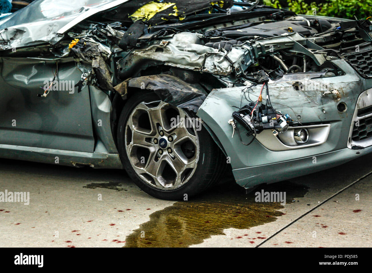 Blood splattered car wreck on the side of the autobahn in Germany Stock Photo