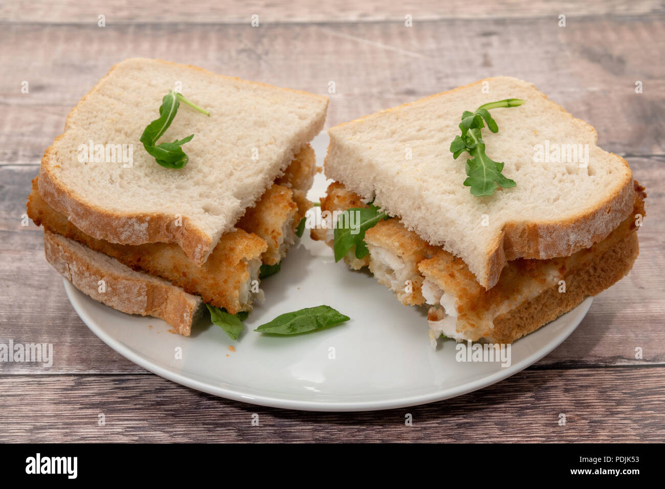 Fish finger stick sandwich with white bread Stock Photo Alamy