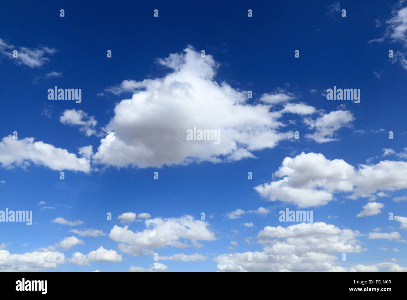 White cumulous, cumulus, cloud, clouds, blue sky, Norfolk, England, UK Stock Photo