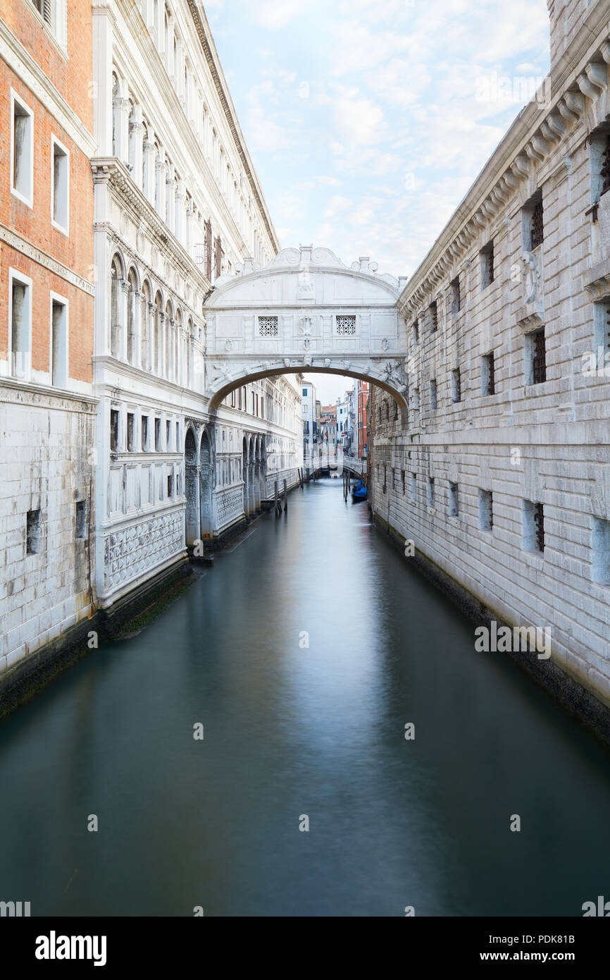 Bridge of Sighs and calm water in the canal, nobody in Venice, Italy Stock Photo