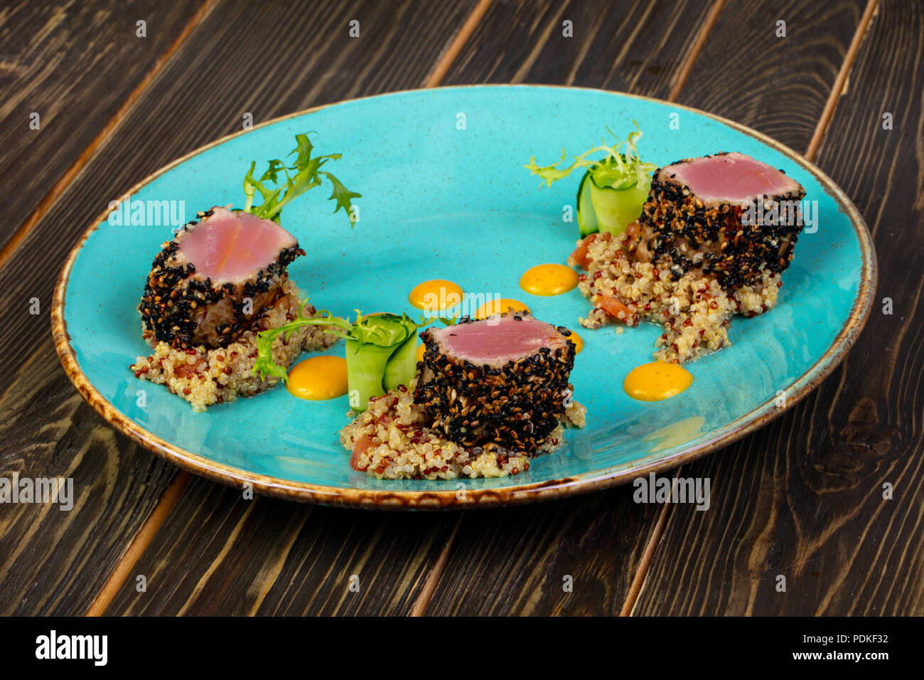Roasted tuna fillet with cinoa Stock Photo Alamy