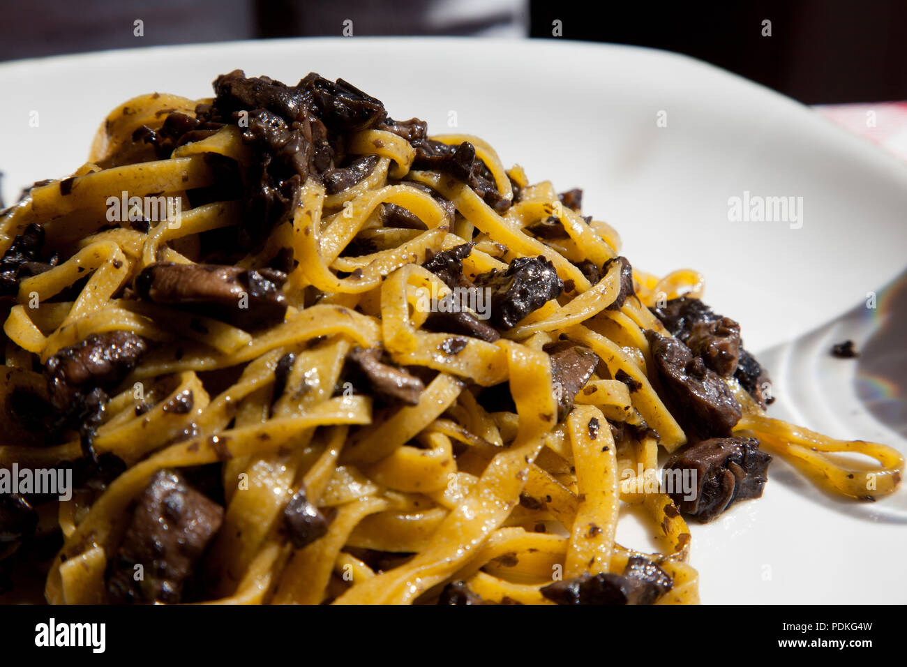 A big pile of mushroom and black truffle fettuccine Stock Photo Alamy