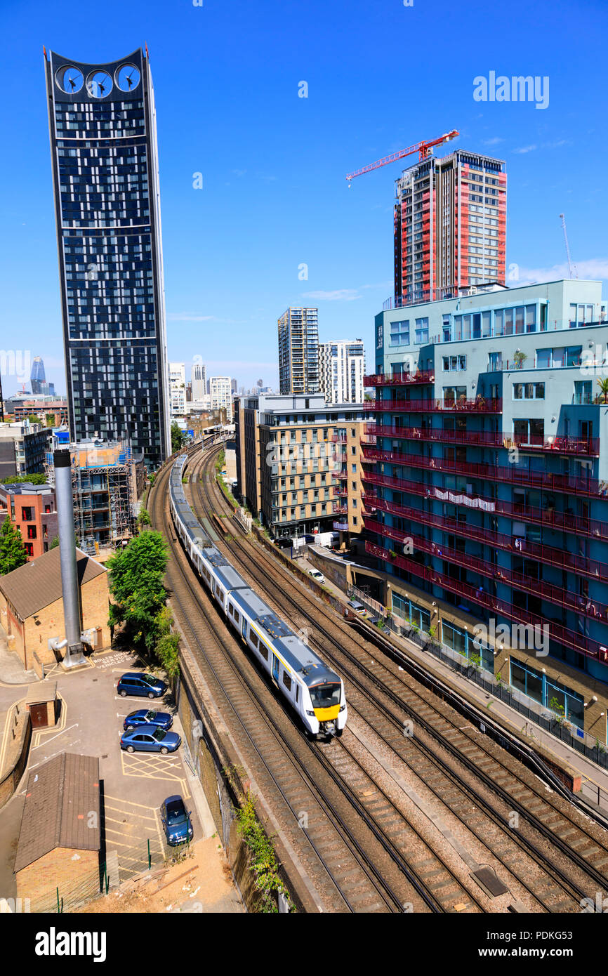 London underground train on tracks with Strata SE1, Electric razor building. Southwark, London, England Stock Photo