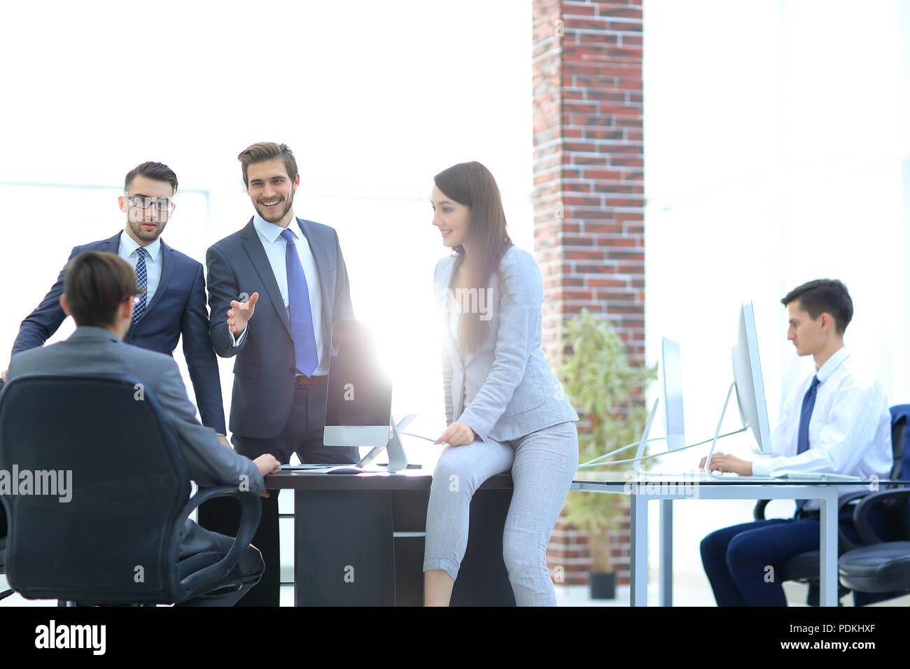 Business people discussing over new business project in office Stock ...