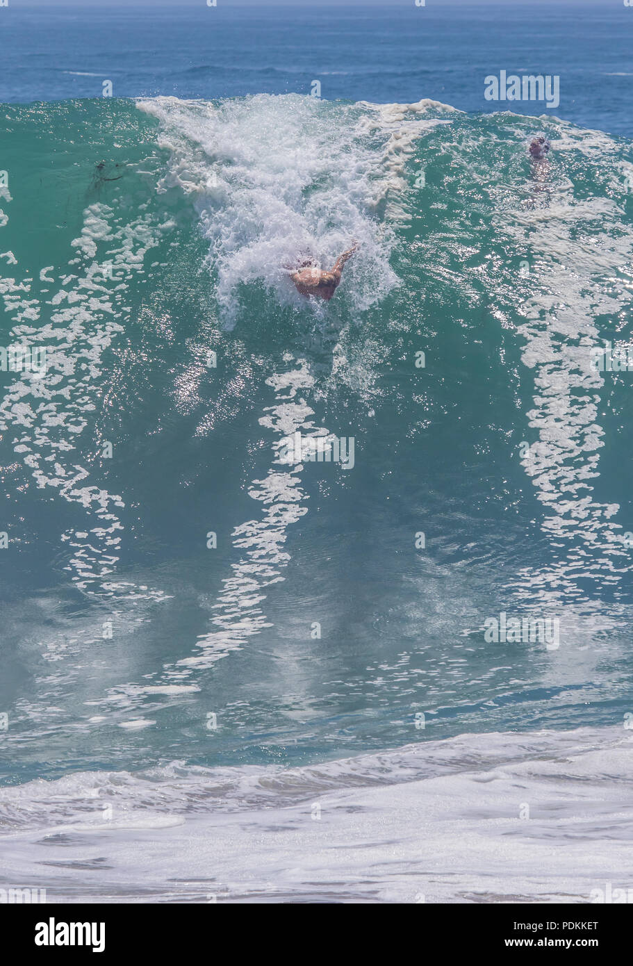 Bodysurfing at the world famous Wedge in Newport Beach California Stock