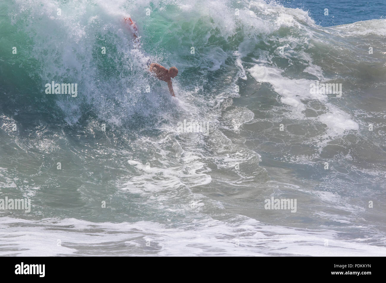 Bodysurfing at the world famous Wedge in Newport Beach California Stock