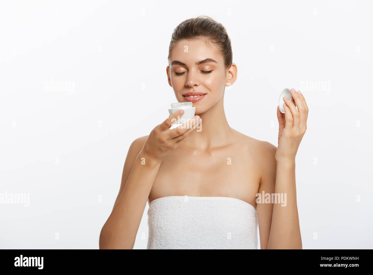 Beautiful Young Woman with Clean Fresh Skin look away. Girl beauty face ...
