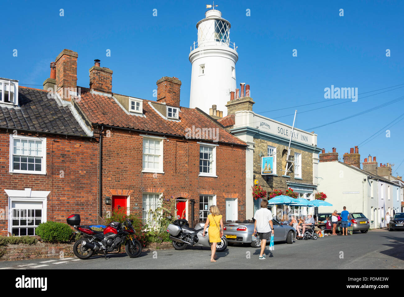 Period cottages, Sole Bay Inn and Lighthouse, East Green, Southwold, Suffolk, England, United Kingdom Stock Photo