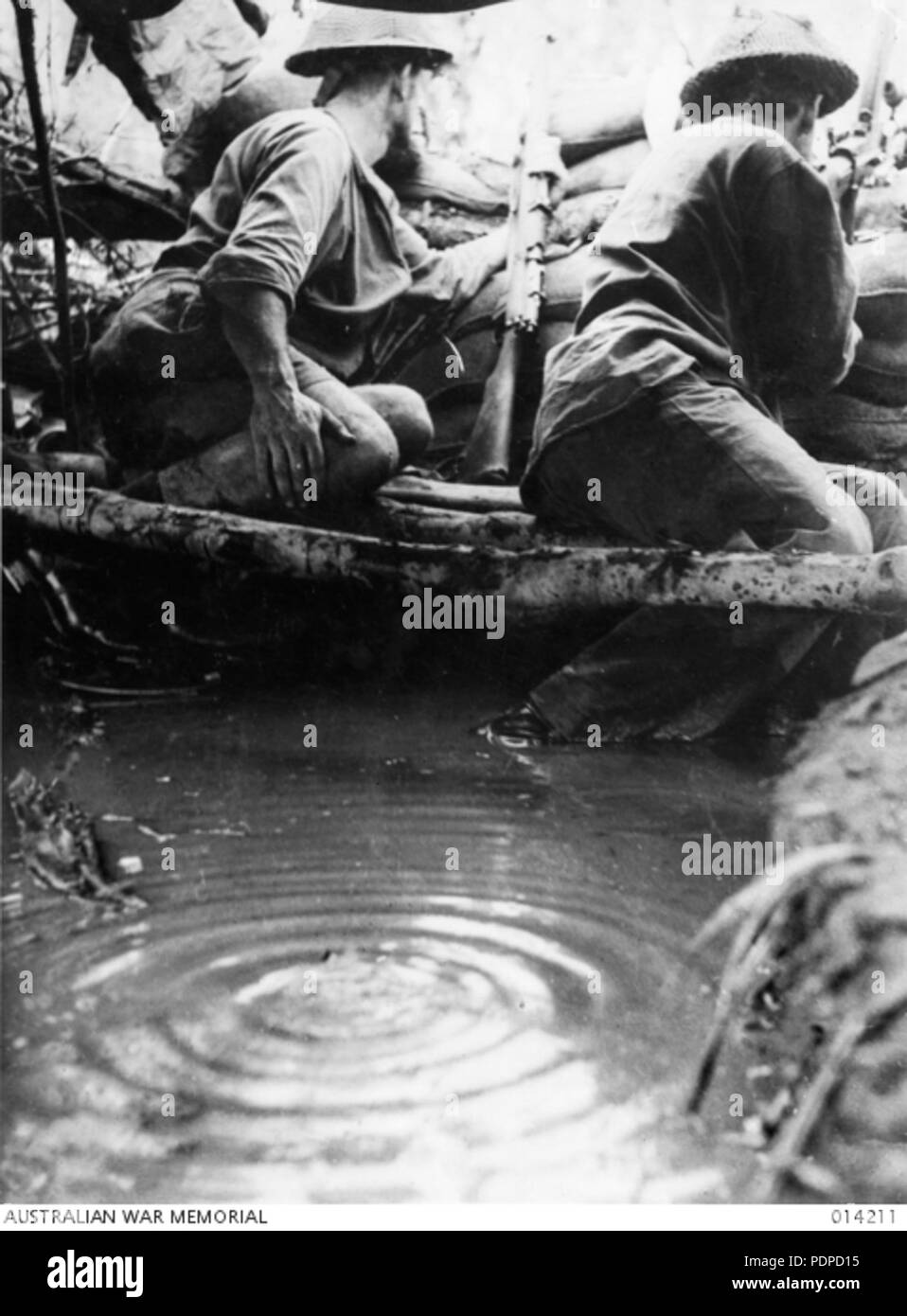 1 014211 Stand to in water filled pit Buna Stock Photo Alamy