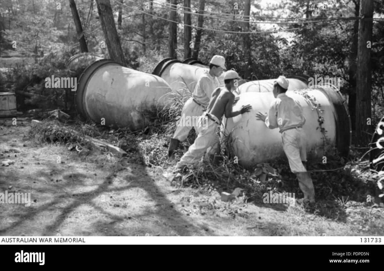 2 131733 CERAMIC CONTAINERS AT WHAT WAS FORMERLY THE TADANOUMI BRANCH OF THE TOKYO 2ND ARMY ARSENAL Stock Photo