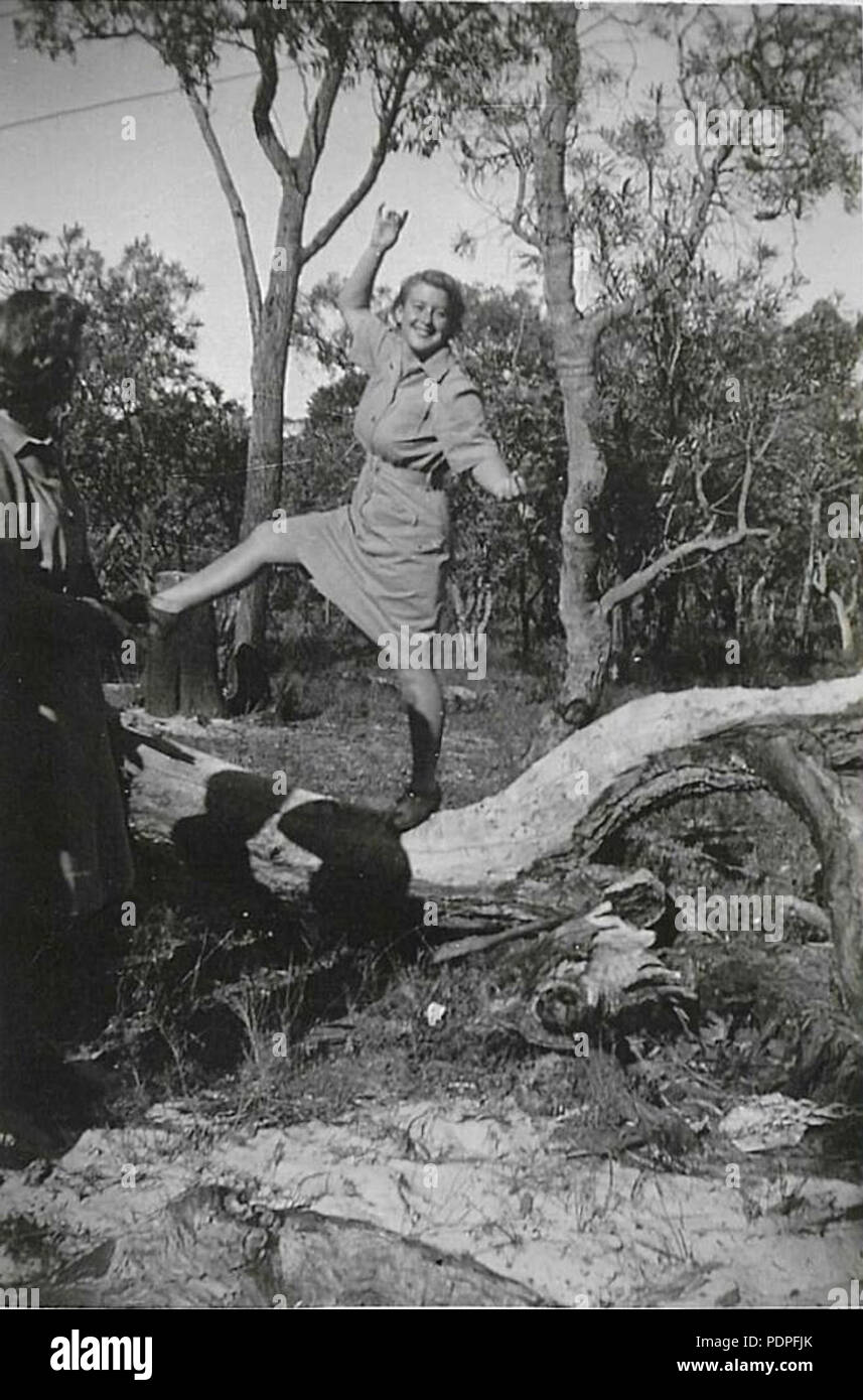 19 AWAS woman on a tree at Bibra Lake, c1944 Stock Photo