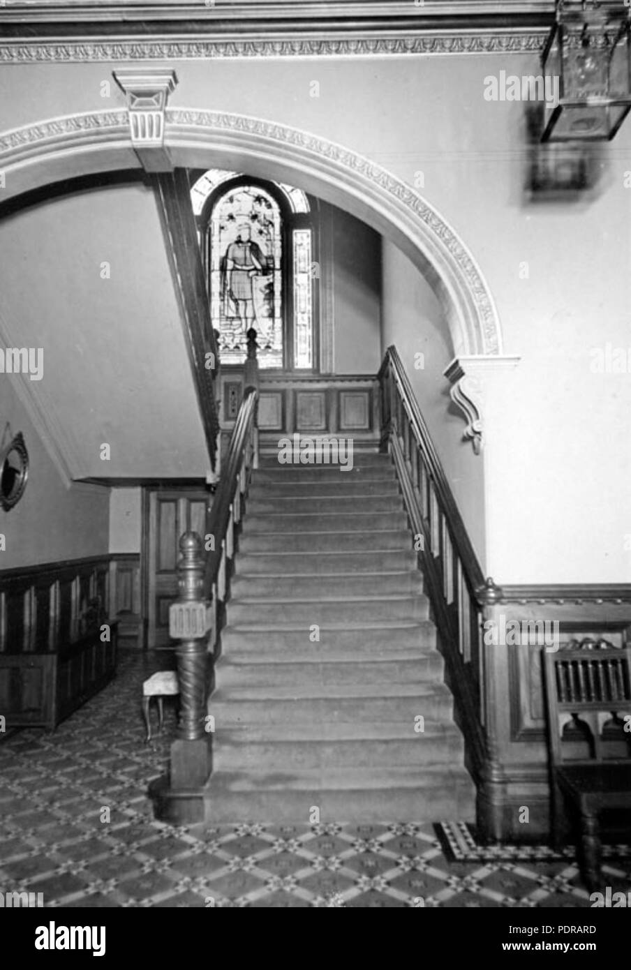 102 Queensland State Archives 1482 View at Government House Main Stairway stained glass window shows Robert Bruce 11 May 1950 Stock Photo
