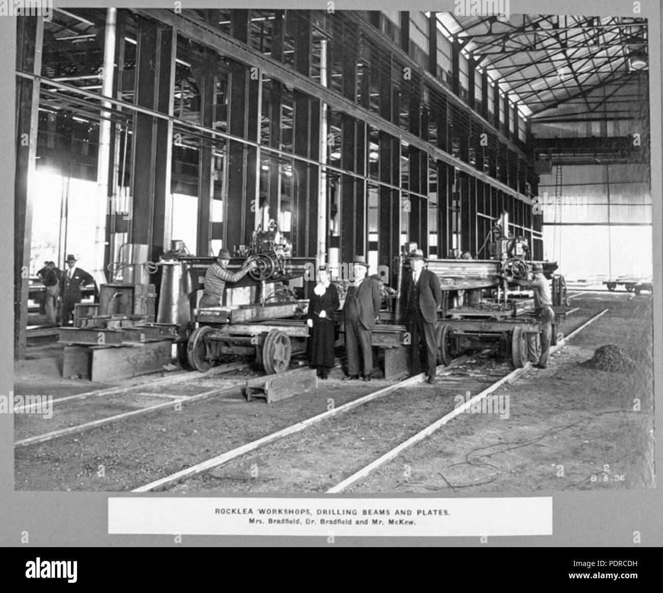 111 Queensland State Archives 3663 Rocklea workshops drilling beam and plates Mrs Bradfield Dr Bradfield and Mr McKew Brisbane 8 May 1936 Stock Photo