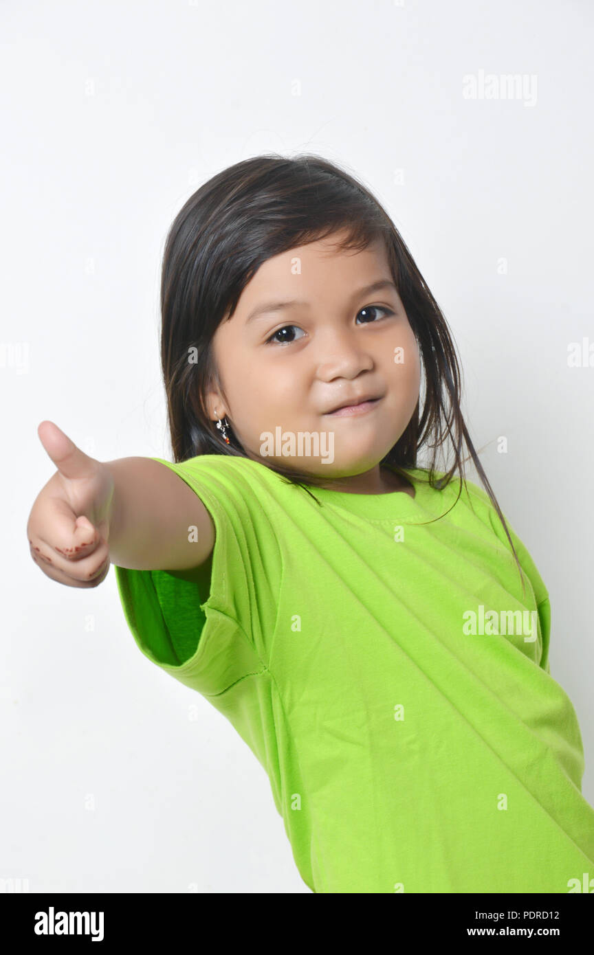 expression asian little girl with green clothes Stock Photo Alamy