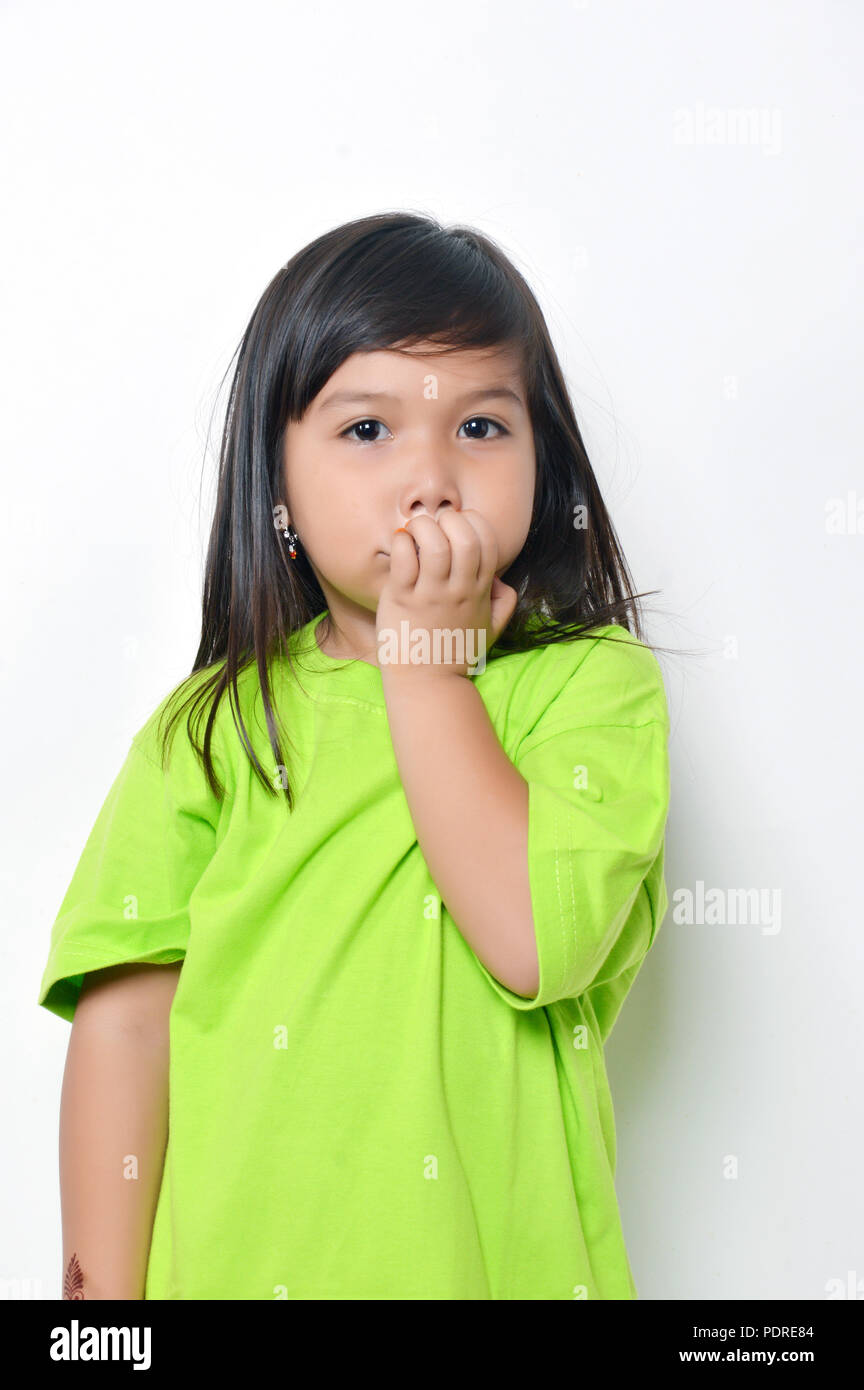 expression asian little girl with green clothes Stock Photo Alamy
