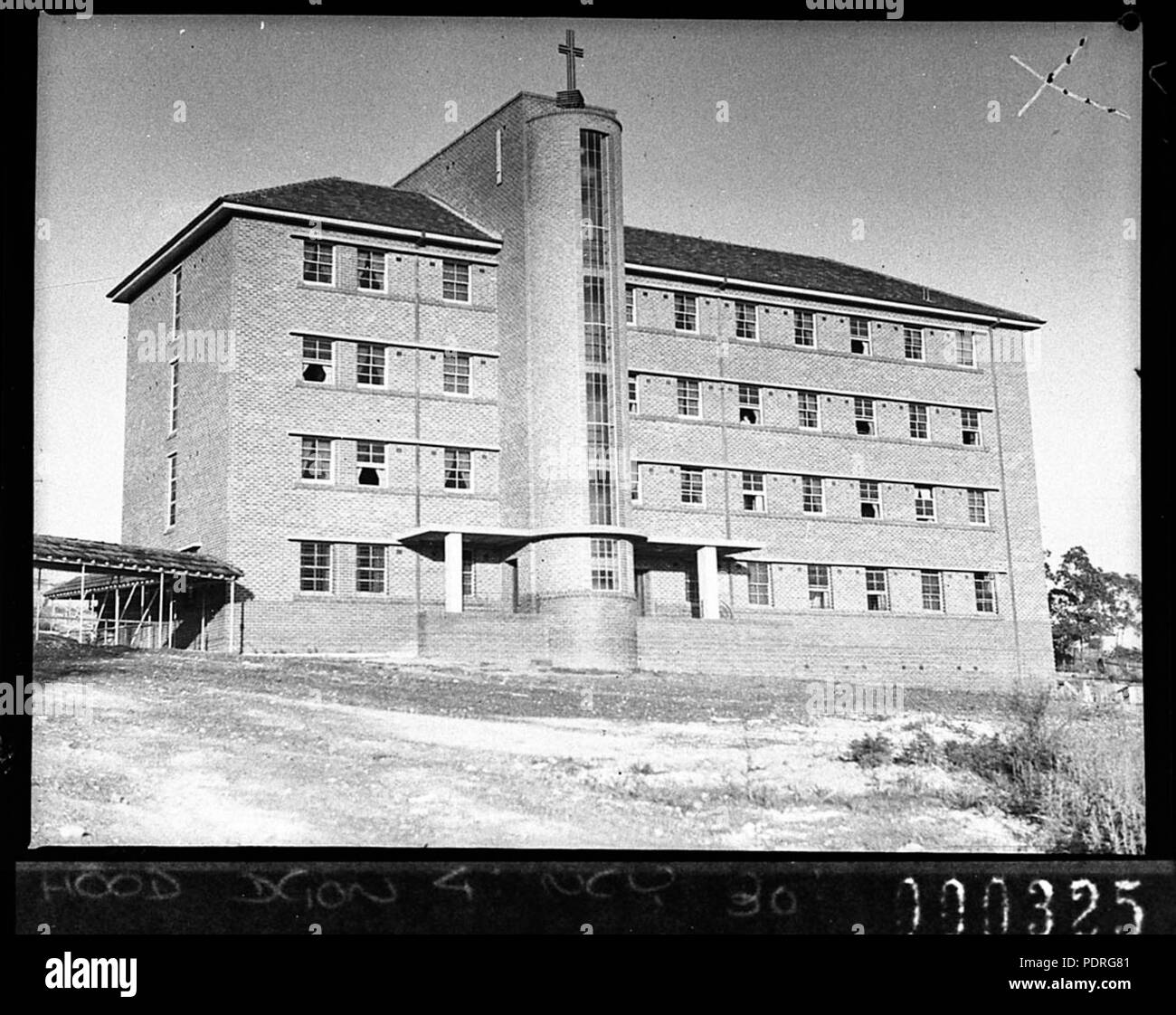 133 SLNSW 12083 Exterior of the front facade showing circular staircase