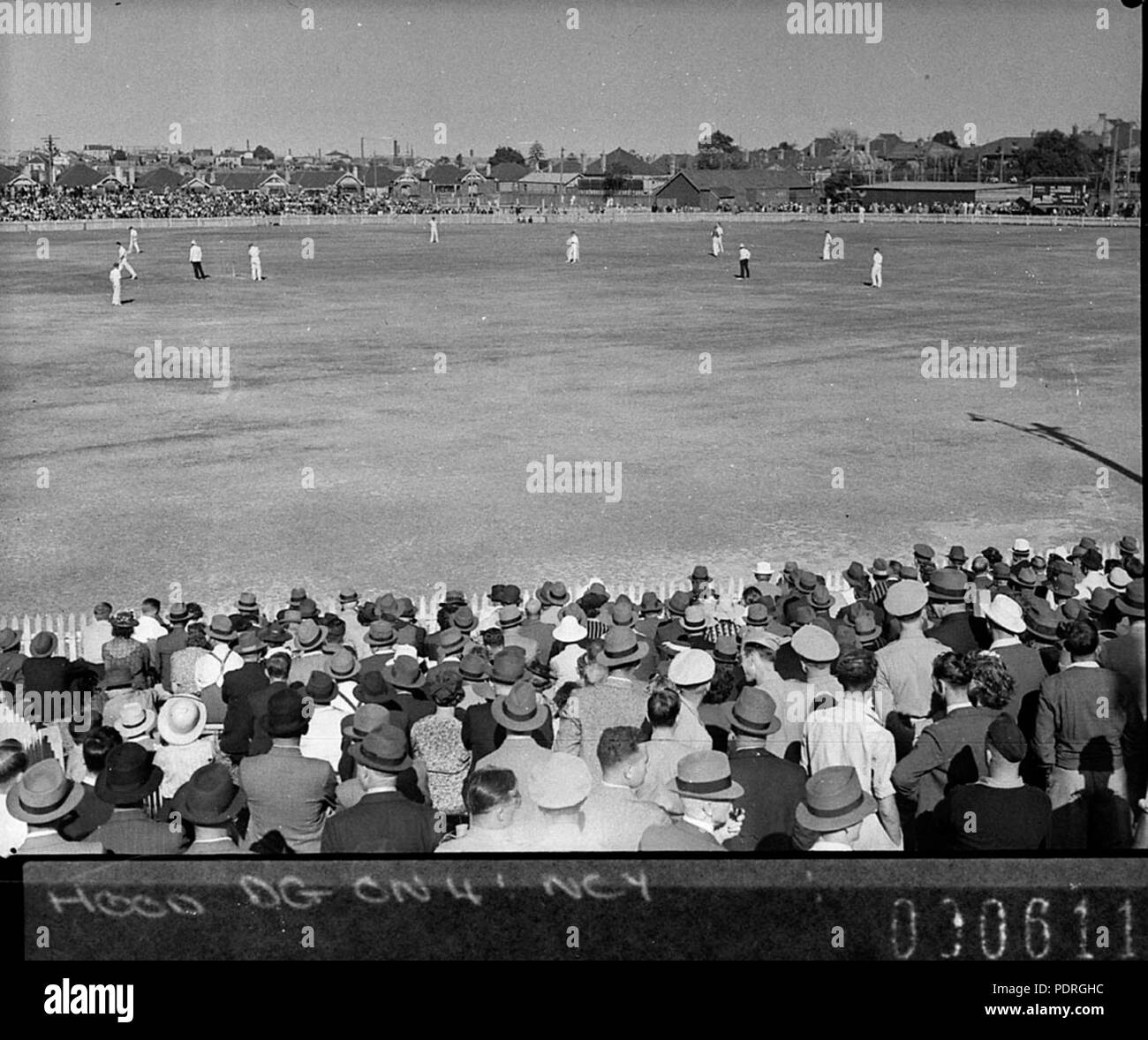 135 SLNSW 13119 Record crowd at cricket at Marrickville Oval Stock
