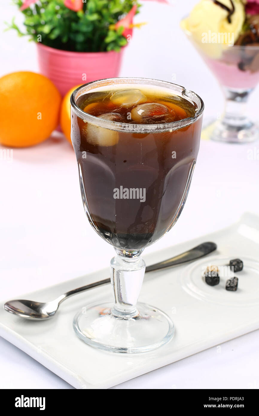 Glass of Cola with Ice Cubes Stock Photo