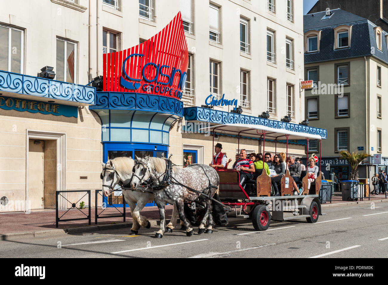 CherbourgOcteville, France May 22, 2017 Tourists in Horse Drawn