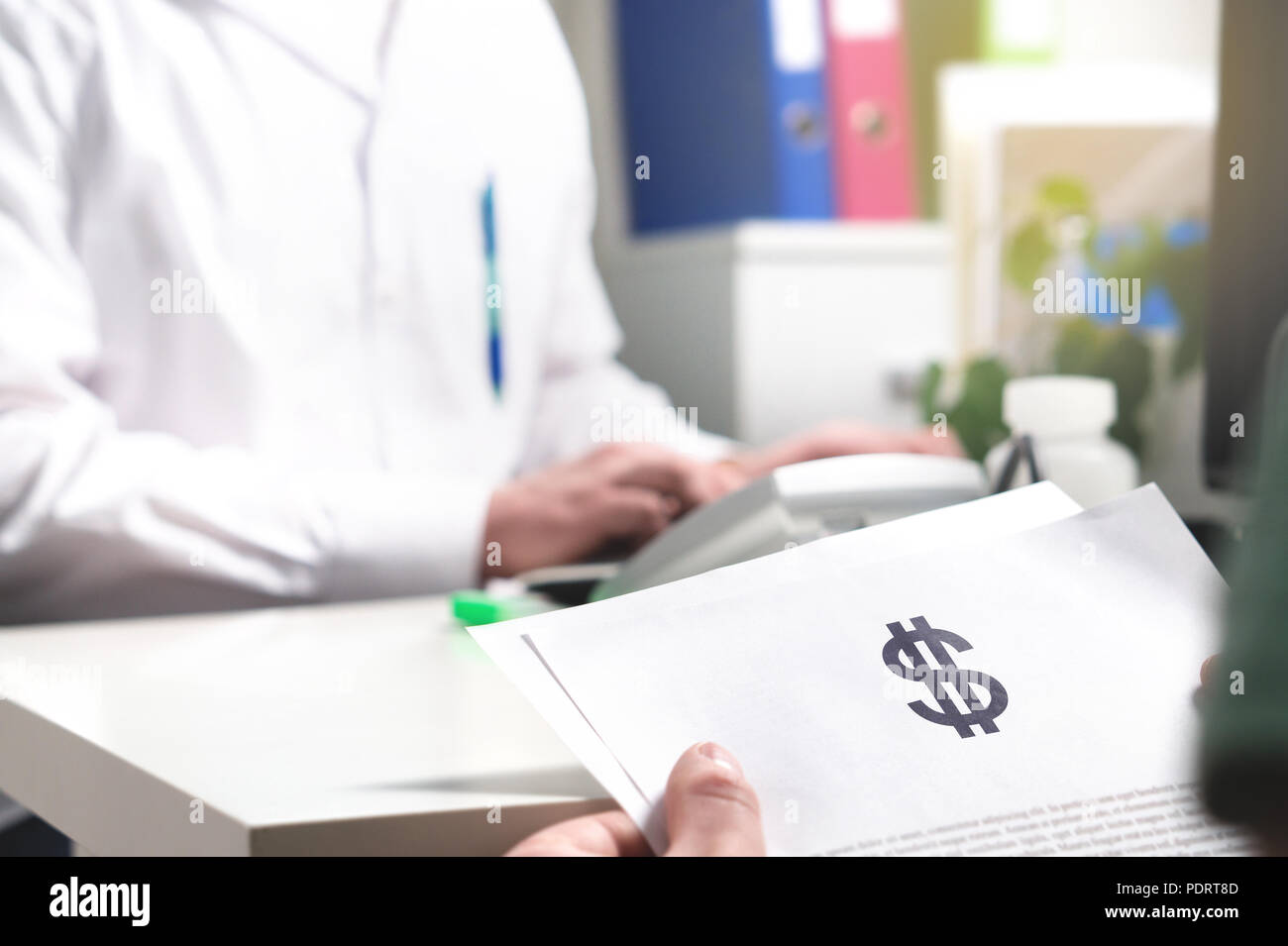Medical and health care prices concept. Patient holding paper document, insurance, bill or invoice with dollar sign in doctor office in hospital. Stock Photo