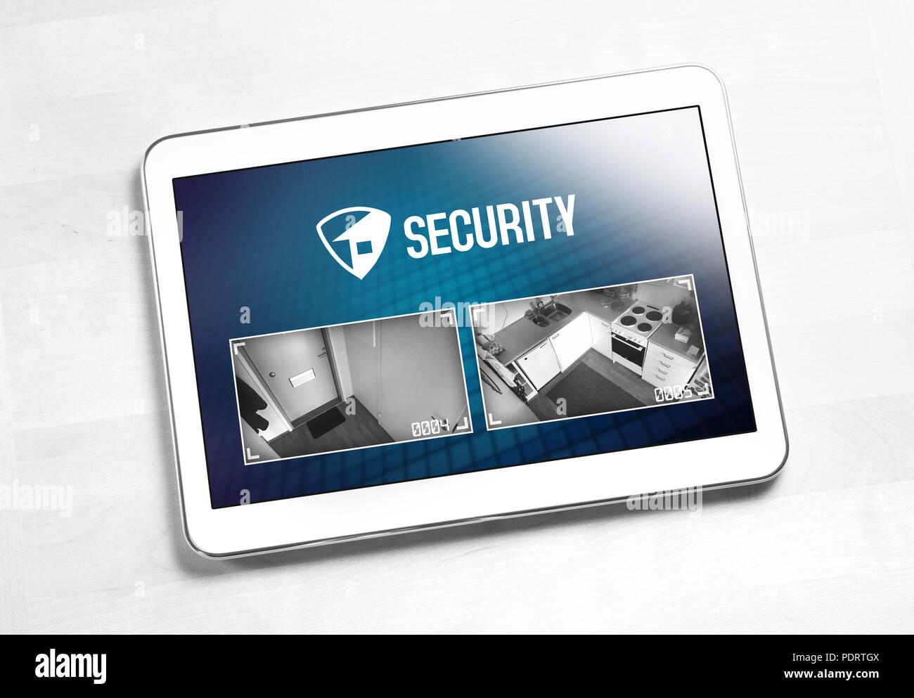 Home security system and application in tablet. Protection and surveillance camera live footage inside a house or apartment. Smart cctv and safety app Stock Photo